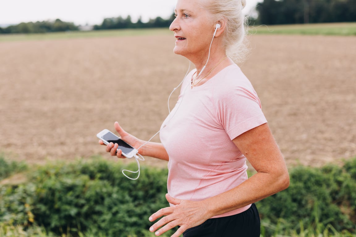 Senior Woman Running Outdoors